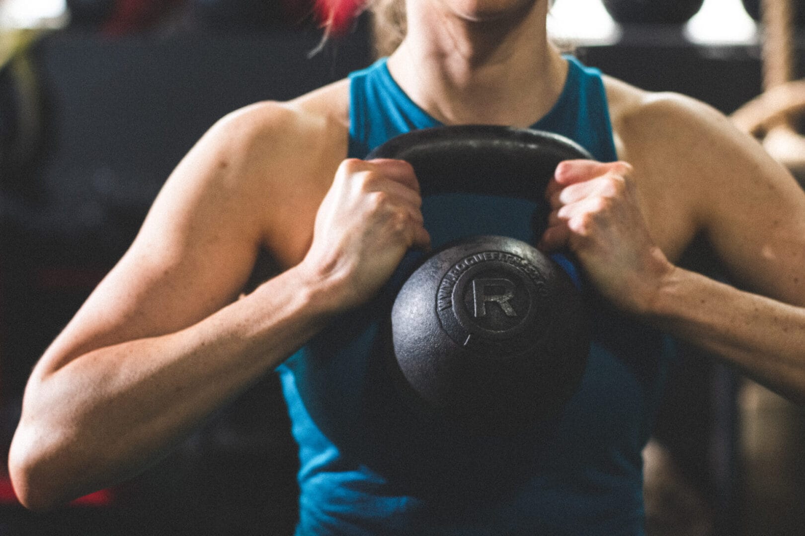 The Top 7 Benefits of Adding Muscle 1 woman kettlebell workout scaled 1