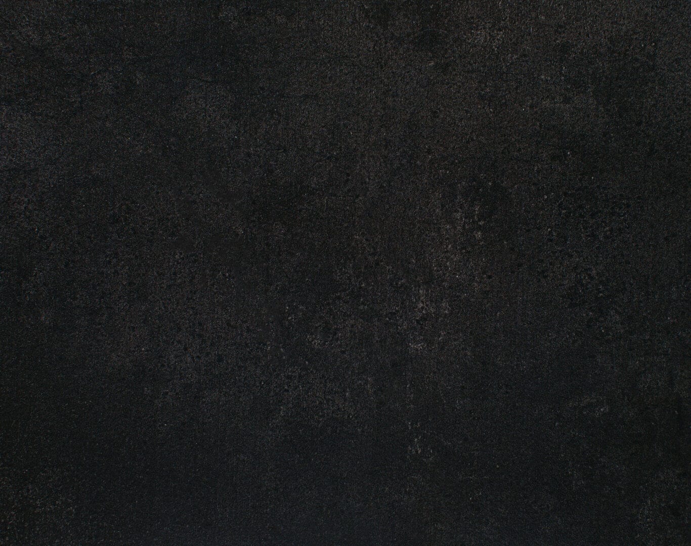 Dark background with a subtle dotted pattern